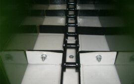 Покриття для шкребкового транспортера